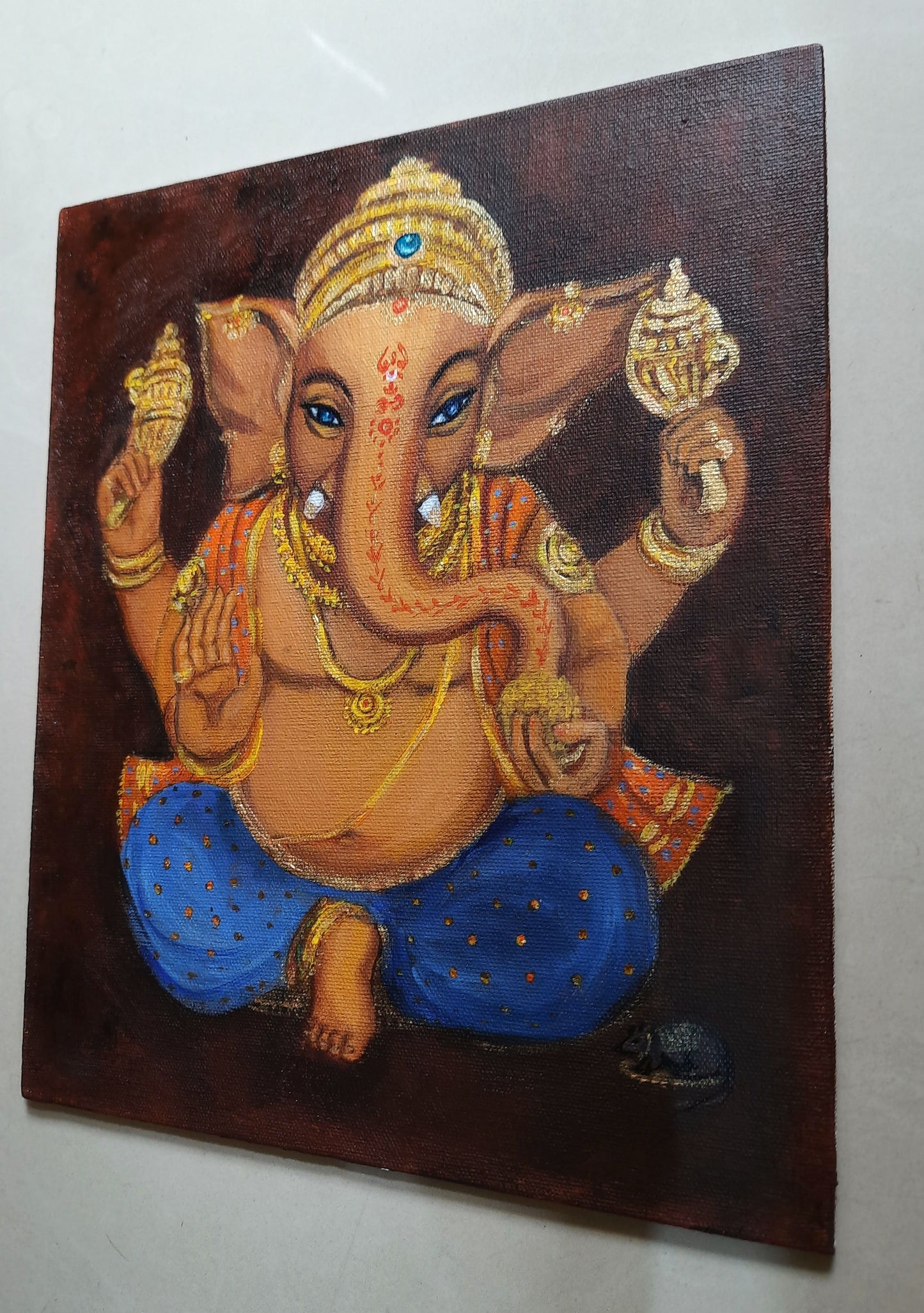 Lord Ganesha with blue eyes, cute Indian wall décor