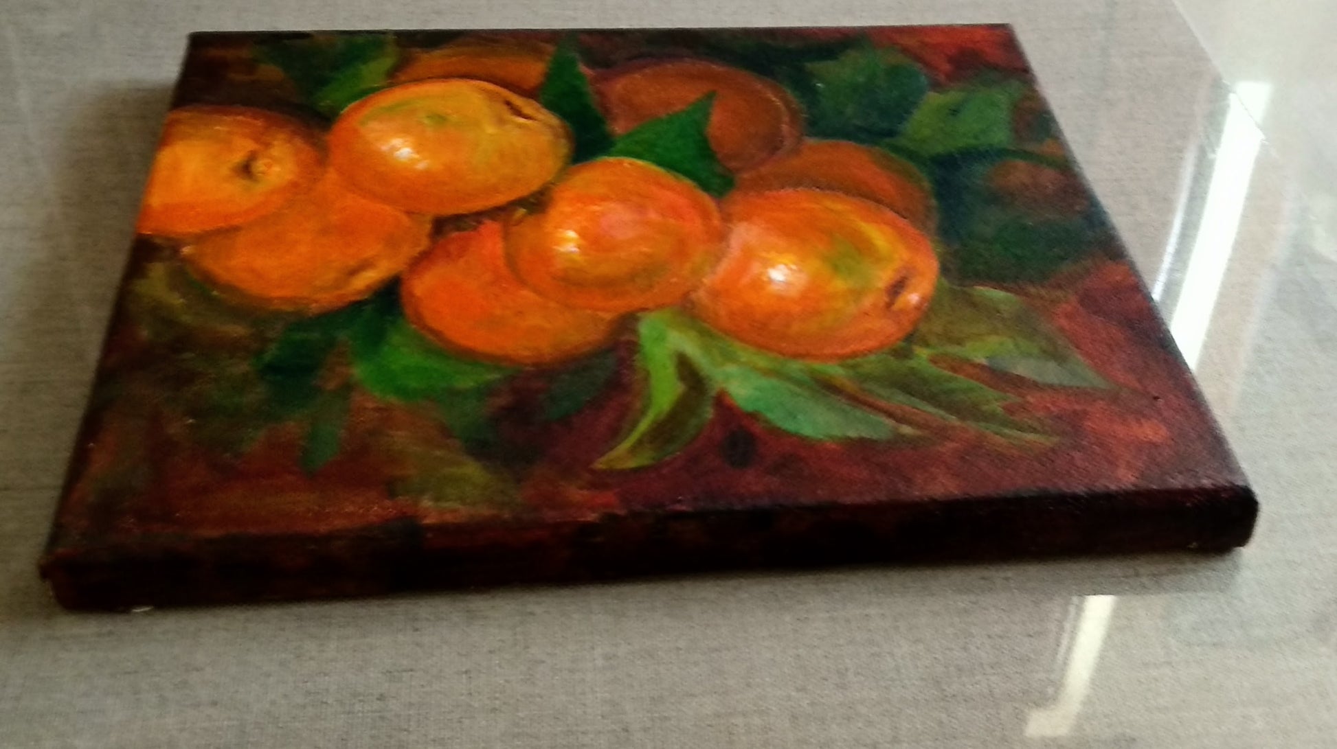 Edge view of Clementine on a branch, acrylic painting on canvas